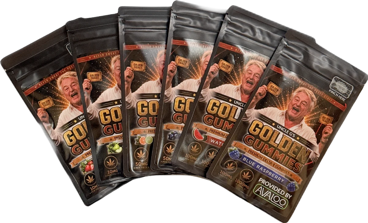 Six bags of Uncle G's Golden Gummies with Greg's face on the label