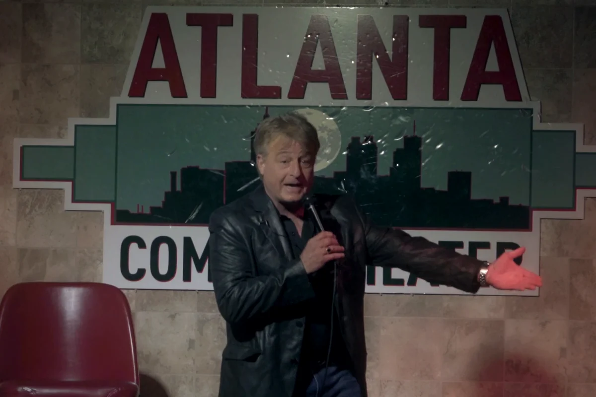 Uncle G under the Atlanta Comedy Theater marquee